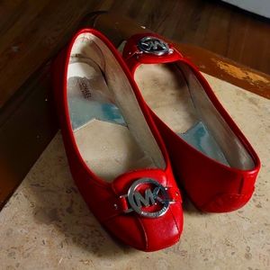 Red flat loafers